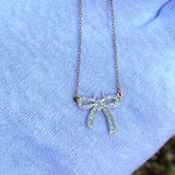 Cz stone bow tie pendant