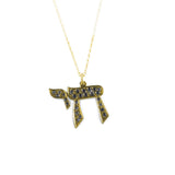 Black diamond encrusted Hai pendant